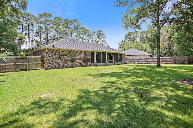 3112 Evans Ave, Navarre, FL 32566 - back of property with a fenced backyard and brick siding