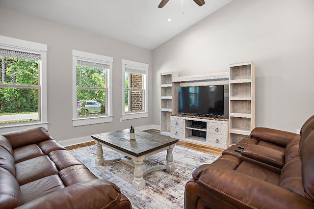 3112 Evans Ave, Navarre, FL 32566 - living area with a ceiling fan, healthy amount of natural light, wood finished floors, and high vaulted ceiling