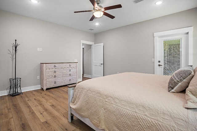 3112 Evans Ave, Navarre, FL 32566 - bedroom with wood finished floors, recessed lighting, and a ceiling fan