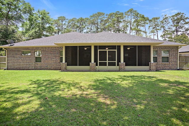 3112 Evans Ave, Navarre, FL 32566 - back of property featuring a sunroom, roof with shingles, and brick siding