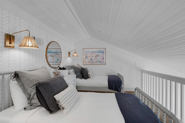 4984 W County Highway 30a Unit 5B, Santa Rosa Beach, FL 32459 - bedroom with lofted ceiling, wooden ceiling, and wallpapered walls