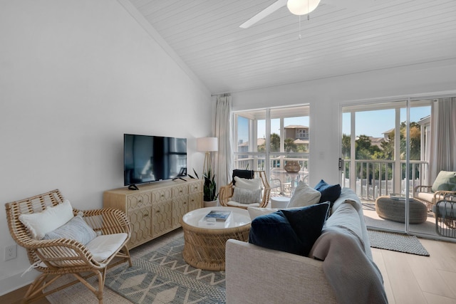 4984 W County Highway 30a Unit 5B, Santa Rosa Beach, FL 32459 - living room with vaulted ceiling, wood finished floors, and a ceiling fan