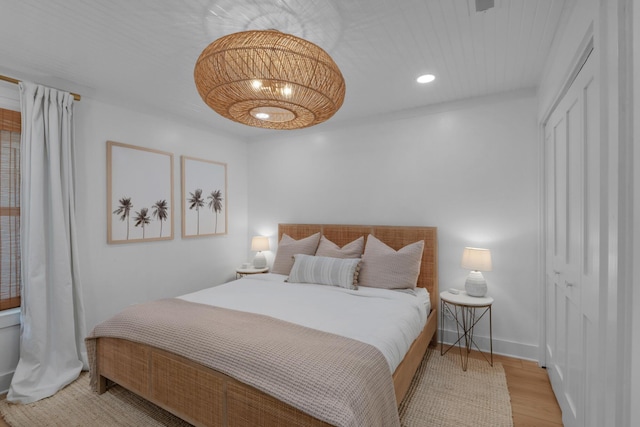 4984 W County Highway 30a Unit 5B, Santa Rosa Beach, FL 32459 - bedroom with a closet, wood finished floors, and recessed lighting