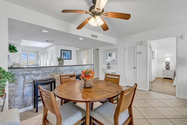 291 Scenic Gulf Dr Unit 400, Miramar Beach, FL 32550 - dining room featuring light tile patterned floors and ceiling fan