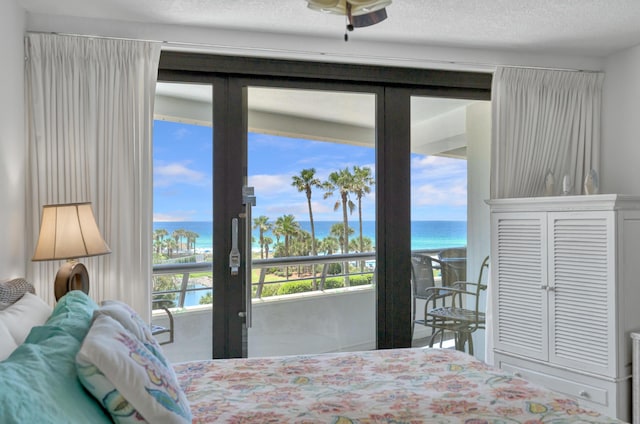291 Scenic Gulf Dr Unit 400, Miramar Beach, FL 32550 - bedroom with a water view and french doors