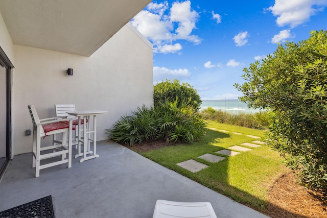 3722 E Co Highway 30a 3 3, Santa Rosa Beach, FL 32459 - view of grassy yard featuring a water view and a patio