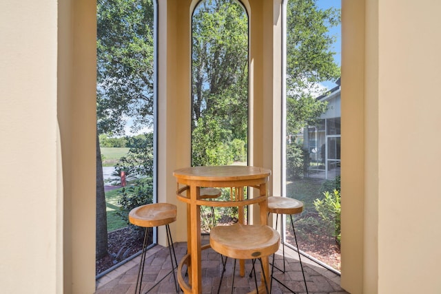 69 Cobalt Ln, Miramar Beach, FL 32550 - dining room featuring stone tile floors