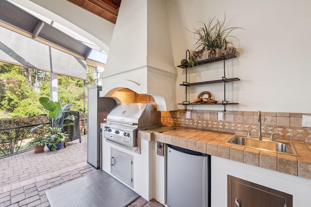 69 Cobalt Ln, Miramar Beach, FL 32550 - view of patio with a sink and area for grilling