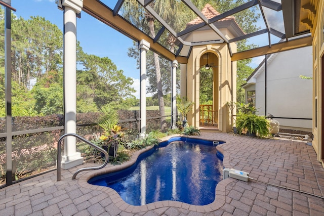 69 Cobalt Ln, Miramar Beach, FL 32550 - unfurnished sunroom featuring a jacuzzi and ceiling fan