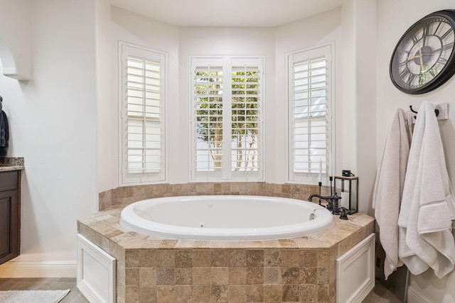 69 Cobalt Ln, Miramar Beach, FL 32550 - full bathroom with a whirlpool tub and vanity