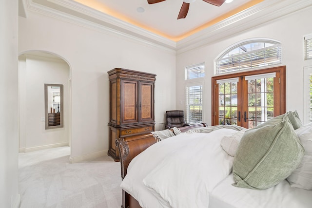 69 Cobalt Ln, Miramar Beach, FL 32550 - bedroom with access to exterior, ornamental molding, arched walkways, light carpet, and french doors