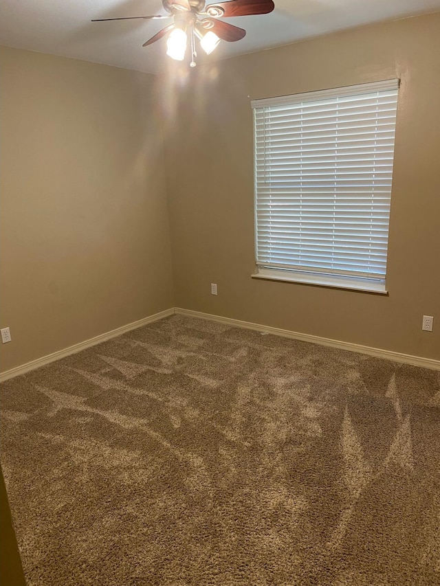 64 Hampton Cir, Niceville, FL 32578 - carpeted spare room featuring a ceiling fan and baseboards
