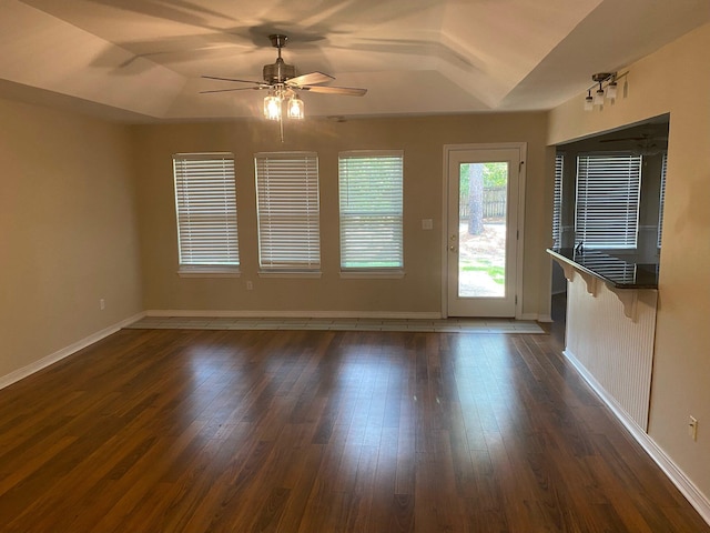 64 Hampton Cir, Niceville, FL 32578 - unfurnished living room with ceiling fan and dark wood-style flooring