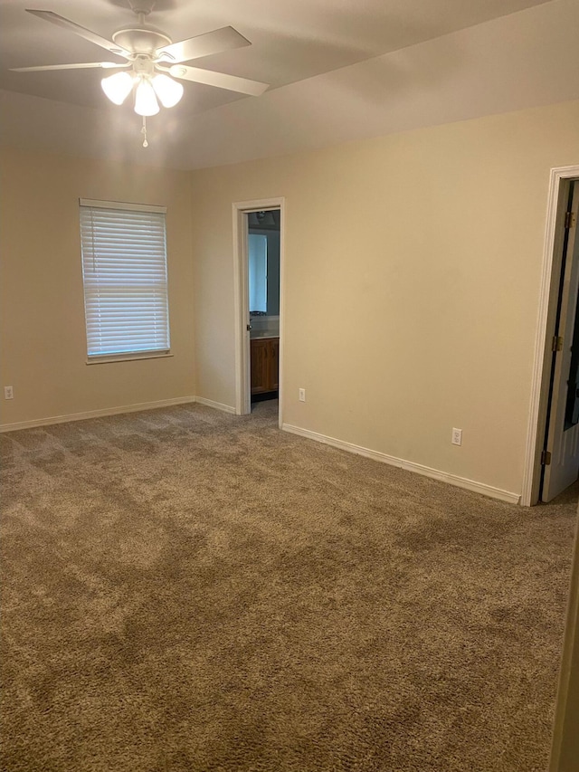 64 Hampton Cir, Niceville, FL 32578 - spare room with a ceiling fan and carpet flooring