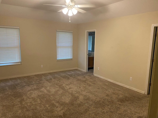 64 Hampton Cir, Niceville, FL 32578 - empty room featuring ceiling fan and dark carpet