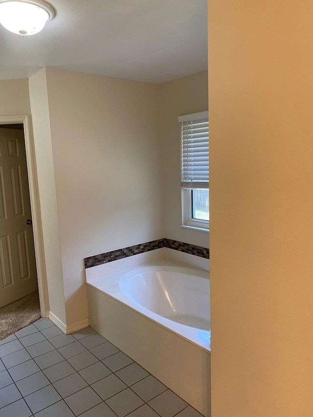 64 Hampton Cir, Niceville, FL 32578 - bathroom with a bath and tile patterned flooring
