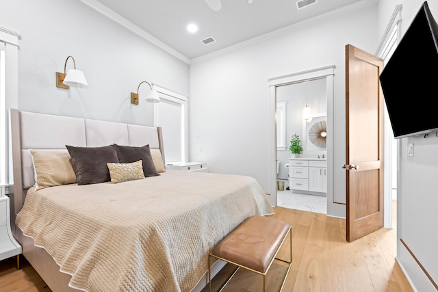17 Palm Court Ln, Inlet Beach, FL 32461 - bedroom featuring crown molding, light wood-type flooring, connected bathroom, and recessed lighting
