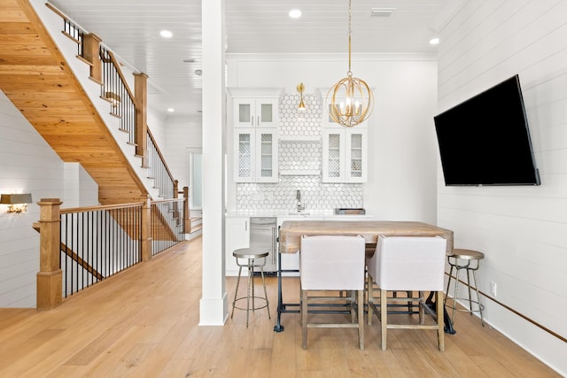 17 Palm Court Ln, Inlet Beach, FL 32461 - dining area with light wood-type flooring, a chandelier, and recessed lighting