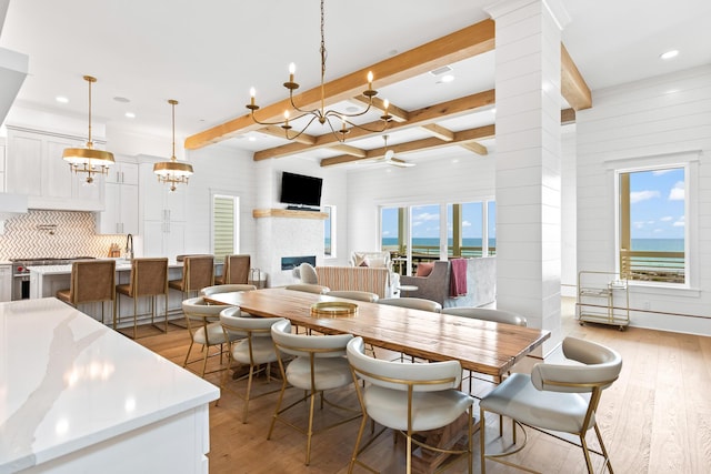 17 Palm Court Ln, Inlet Beach, FL 32461 - dining space featuring a chandelier, light wood-type flooring, decorative columns, beam ceiling, and recessed lighting