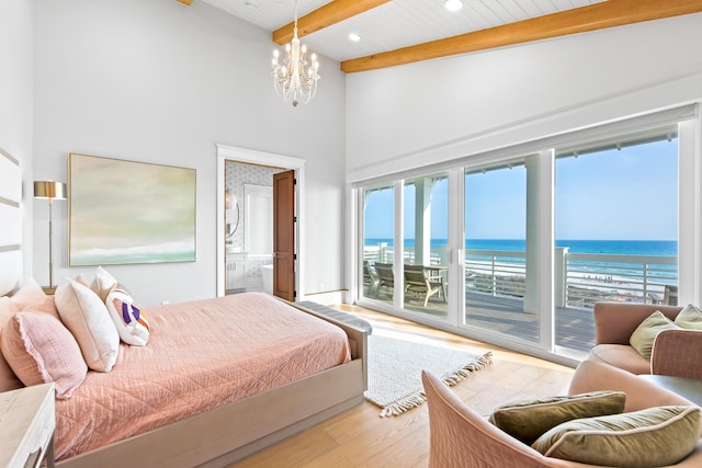 17 Palm Court Ln, Inlet Beach, FL 32461 - bedroom featuring access to exterior, a chandelier, a high ceiling, beamed ceiling, and light wood-style floors