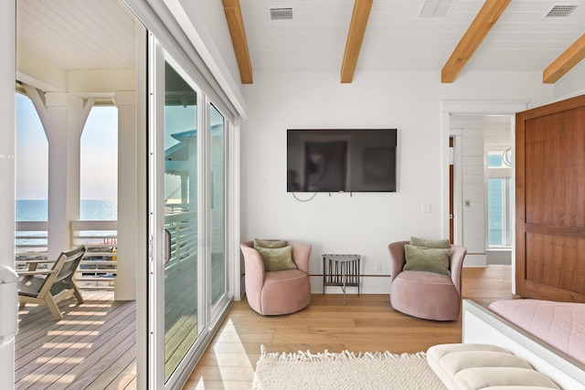 17 Palm Court Ln, Inlet Beach, FL 32461 - living area featuring light wood-type flooring and beamed ceiling