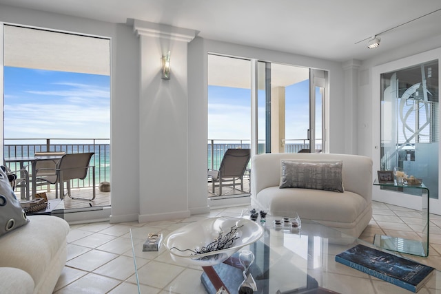 514 Gulf Shore Dr Unit 401, Destin, FL 32541 - tiled living area featuring baseboards