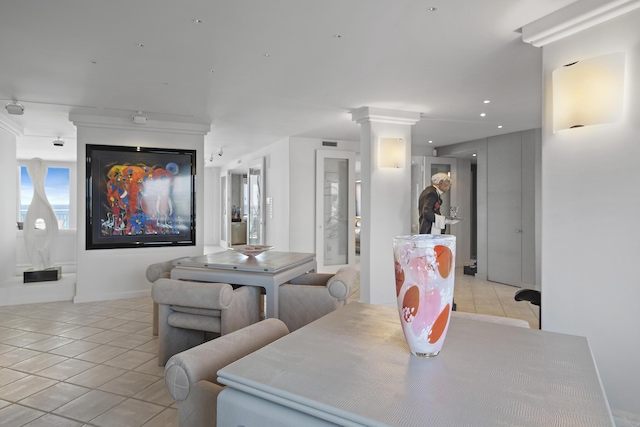 514 Gulf Shore Dr Unit 401, Destin, FL 32541 - dining space featuring light tile patterned flooring and ornate columns