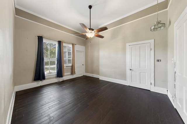 5108 Escambia St, Milton, FL 32570 - unfurnished room featuring dark wood-type flooring, ceiling fan, and crown molding