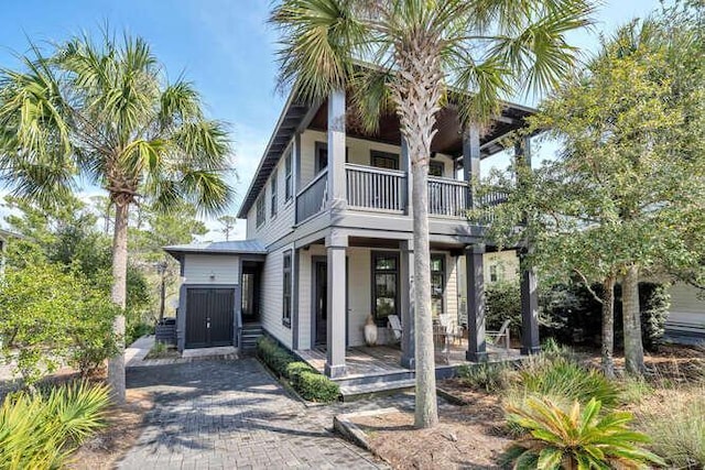 23 The Greenway Loop, Inlet Beach, FL 32461 - view of front of house featuring a balcony