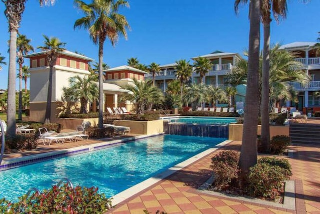 23 The Greenway Loop, Inlet Beach, FL 32461 - outdoor pool featuring a jacuzzi and a patio