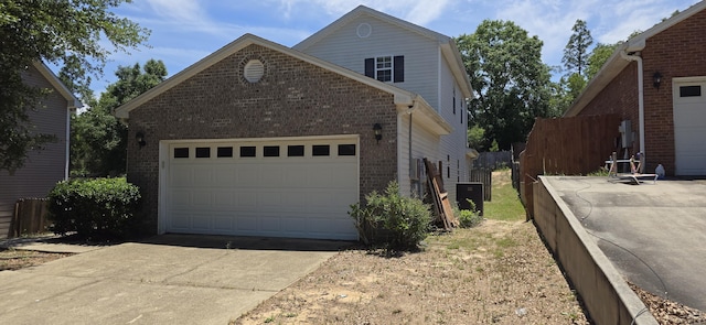 2496 S Lakeview Dr, Crestview, FL 32536 - view of front facade with brick siding, concrete driveway, and an attached garage