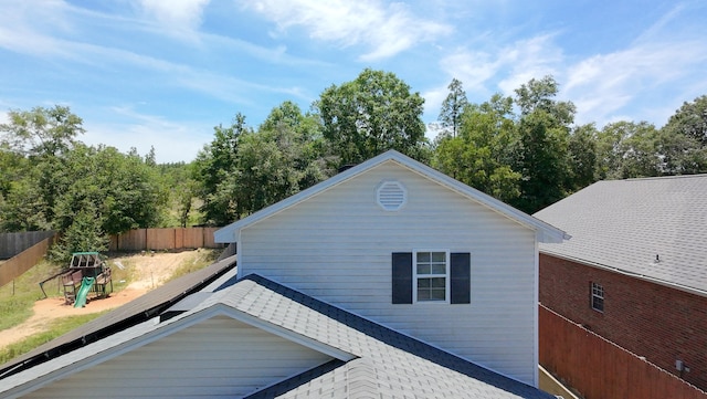 2496 S Lakeview Dr, Crestview, FL 32536 - view of side of property featuring a shingled roof