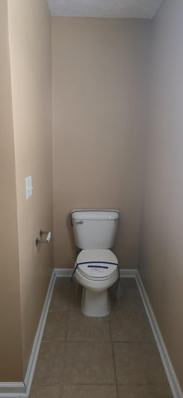 2496 S Lakeview Dr, Crestview, FL 32536 - bathroom featuring tile patterned flooring and toilet