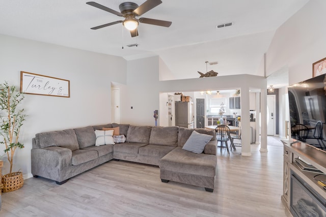 405 Bobby Dr, Crestview, FL 32536 - living room featuring ceiling fan, light wood-type flooring, and high vaulted ceiling