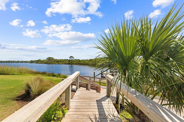 23223 Front Beach Rd # 112, Panama City Beach, FL 32413 - view of community featuring a water view and a lawn
