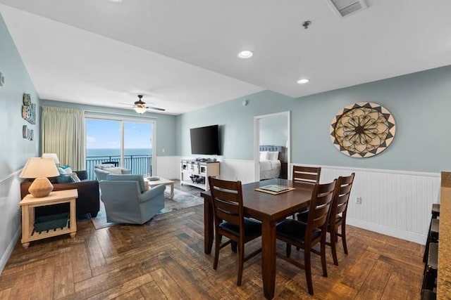 16701 Front Beach Rd Unit 1807, Panama City Beach, FL 32413 - dining room featuring wainscoting and a ceiling fan