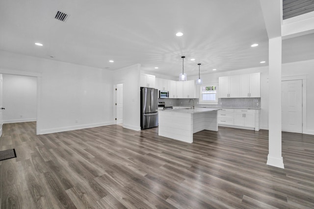 2672 Chat Holley Rd, Santa Rosa Beach, FL 32459 - unfurnished living room featuring recessed lighting and dark wood-style floors