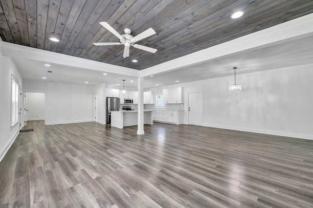 2672 Chat Holley Rd, Santa Rosa Beach, FL 32459 - unfurnished living room featuring a ceiling fan, dark wood finished floors, wooden ceiling, recessed lighting, and a chandelier