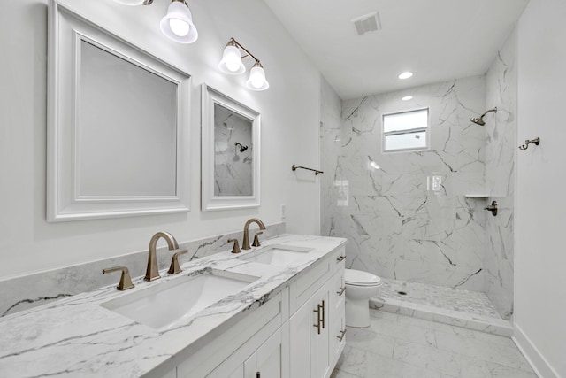 2672 Chat Holley Rd, Santa Rosa Beach, FL 32459 - full bathroom with marble look tiles, double vanity, a marble finish shower, and recessed lighting