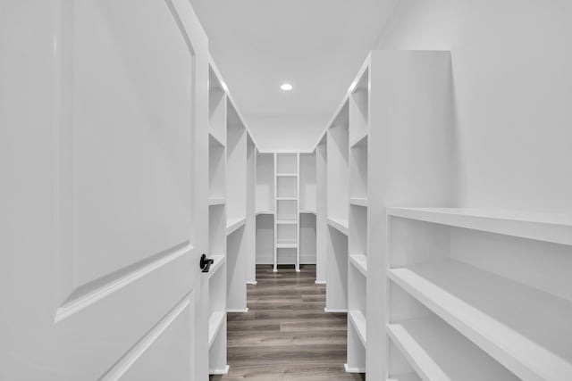 2672 Chat Holley Rd, Santa Rosa Beach, FL 32459 - spacious closet featuring wood finished floors