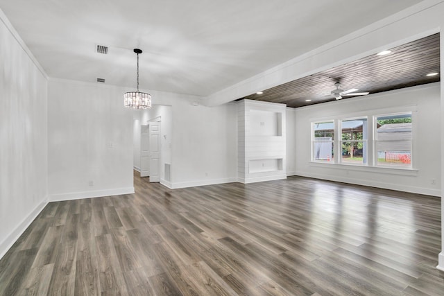 2672 Chat Holley Rd, Santa Rosa Beach, FL 32459 - unfurnished living room featuring dark wood-type flooring, a chandelier, a ceiling fan, ornamental molding, and recessed lighting