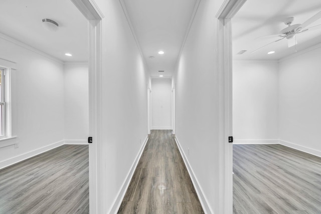 2672 Chat Holley Rd, Santa Rosa Beach, FL 32459 - hallway featuring wood finished floors, ornamental molding, and recessed lighting