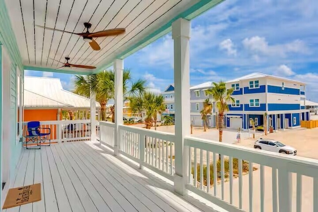 7411 Grand Navarre Blvd, Navarre, FL 32566 - wooden deck featuring ceiling fan