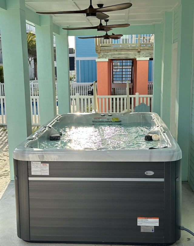 7411 Grand Navarre Blvd, Navarre, FL 32566 - view of patio featuring an indoor hot tub and ceiling fan