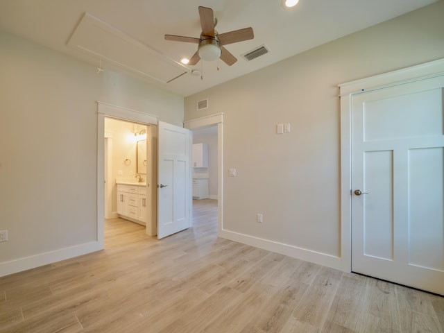 116 E Georgie Pt, Washington, FL 32459 - unfurnished bedroom featuring attic access, light wood finished floors, recessed lighting, connected bathroom, and a ceiling fan