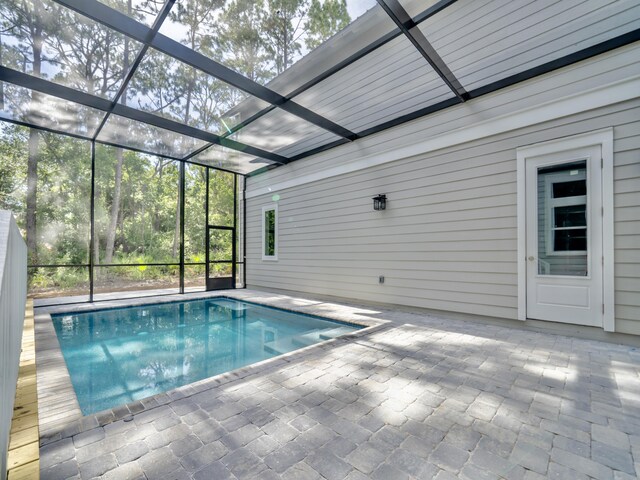 116 E Georgie Pt, Washington, FL 32459 - outdoor pool with a patio area and a lanai
