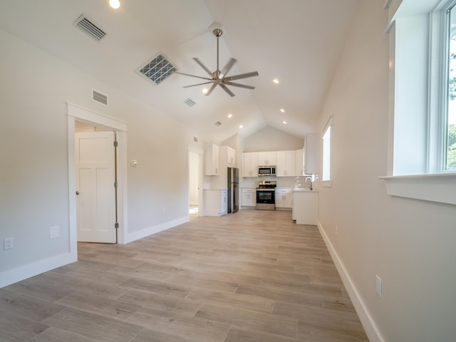 116 E Georgie Pt, Washington, FL 32459 - unfurnished living room with a ceiling fan, recessed lighting, high vaulted ceiling, and light wood finished floors