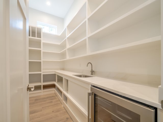 116 E Georgie Pt, Washington, FL 32459 - pantry featuring beverage cooler and a sink