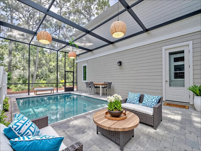 116 E Georgie Pt, Washington, FL 32459 - swimming pool featuring a patio area, glass enclosure, and outdoor lounge area