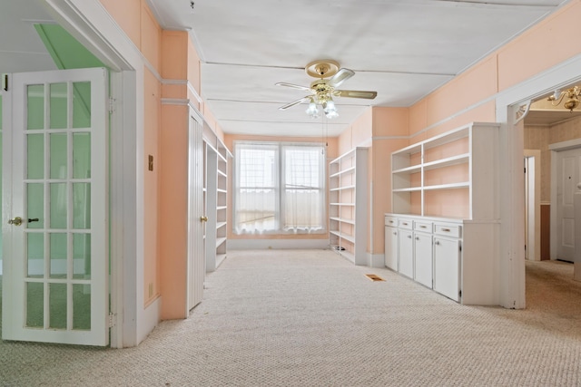 273 E Live Oak Ave, Defuniak Springs, FL 32435 - hallway featuring light carpet